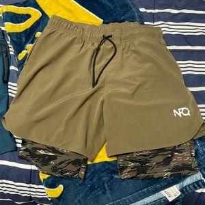 Neverfuckingquit OD green shorts with tiger stripe camo spandex. 2 in 1 shorts.